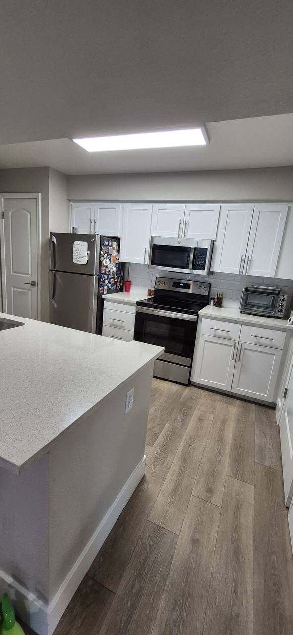 Fresh white kitchen cleaned by Affordable Pro Home Cleaners